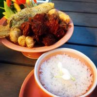 Kao-Chae : Traditional Thai Dish during Summer Time, Cooked Rice Soaked in Iced Water with Jasmine Flowers and Eaten with Assorted Side Dish like Sweeten Pork